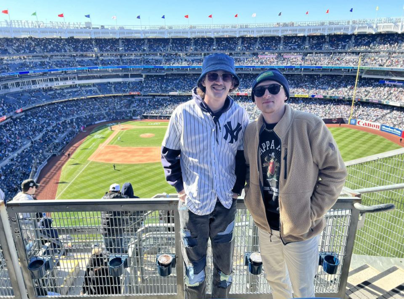 Two students attending a NY Yankees game during their free day (and the Yankees won!)