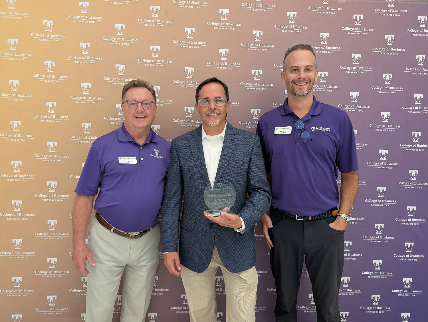 Matt Miller being presented his award by Career staff