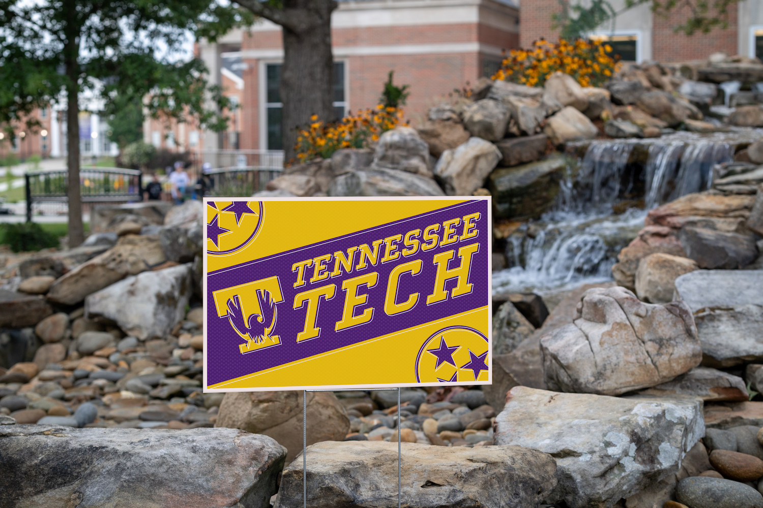 Tech Pride Sign in front of Fearless Falls.