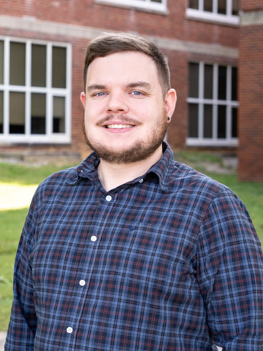 An outdoor portrait of Joey Gill.