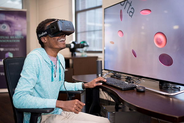 Student using a virtual reality headset.