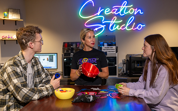 Jeffers Learning Resources Center Creation Studio director and students.