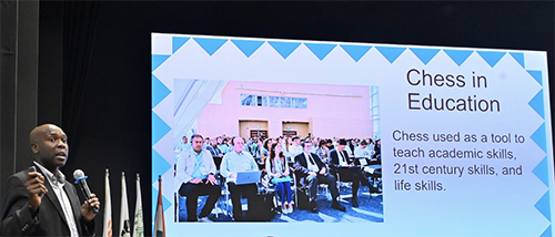 George Chitiyo speaking at an international chess conference.