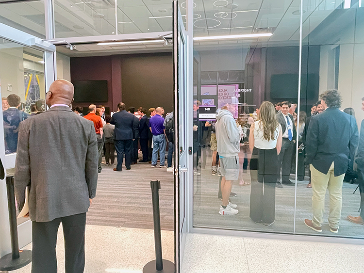 Students posing with their project poster