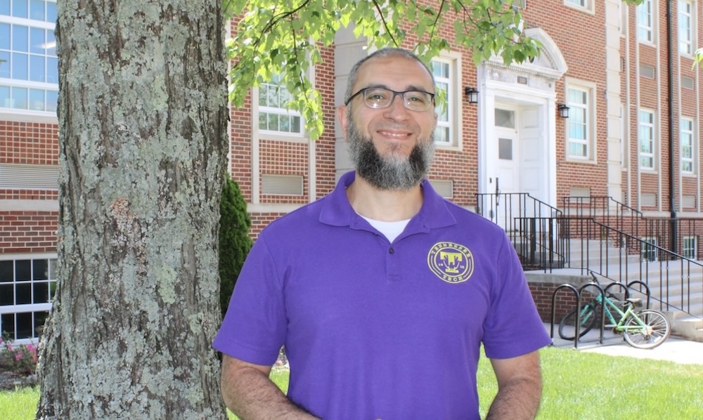 Amr Hilal, Ph.D., stands in front of Bruner Hall