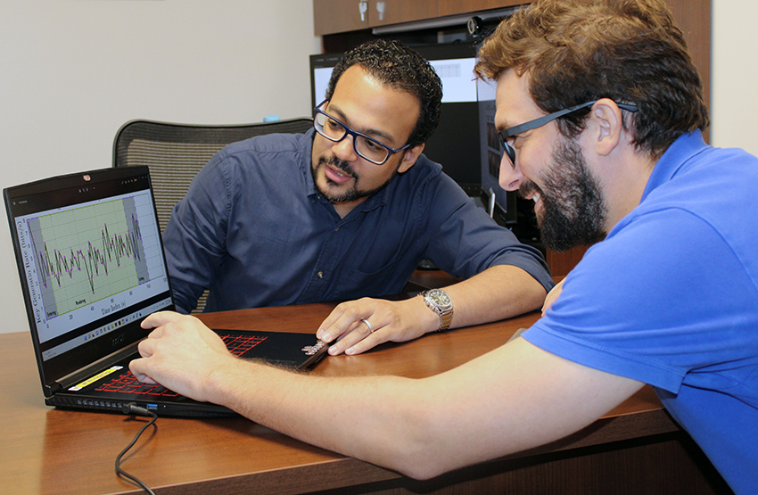 Dr. Isamil with computer science student