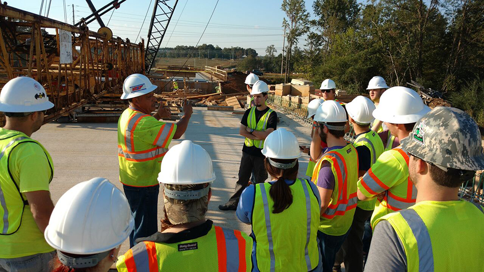 Students in the field on bridge construction site