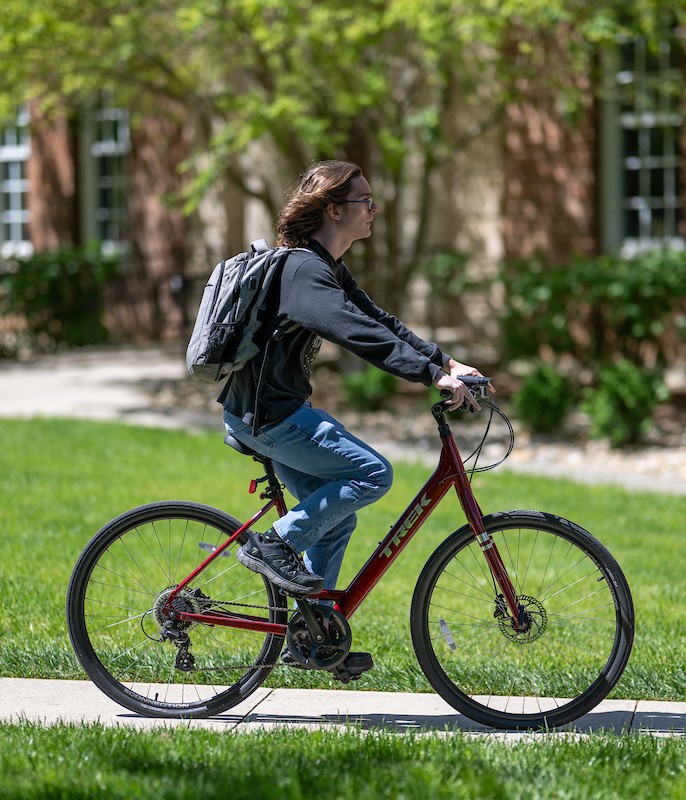 Student Biking on Campus