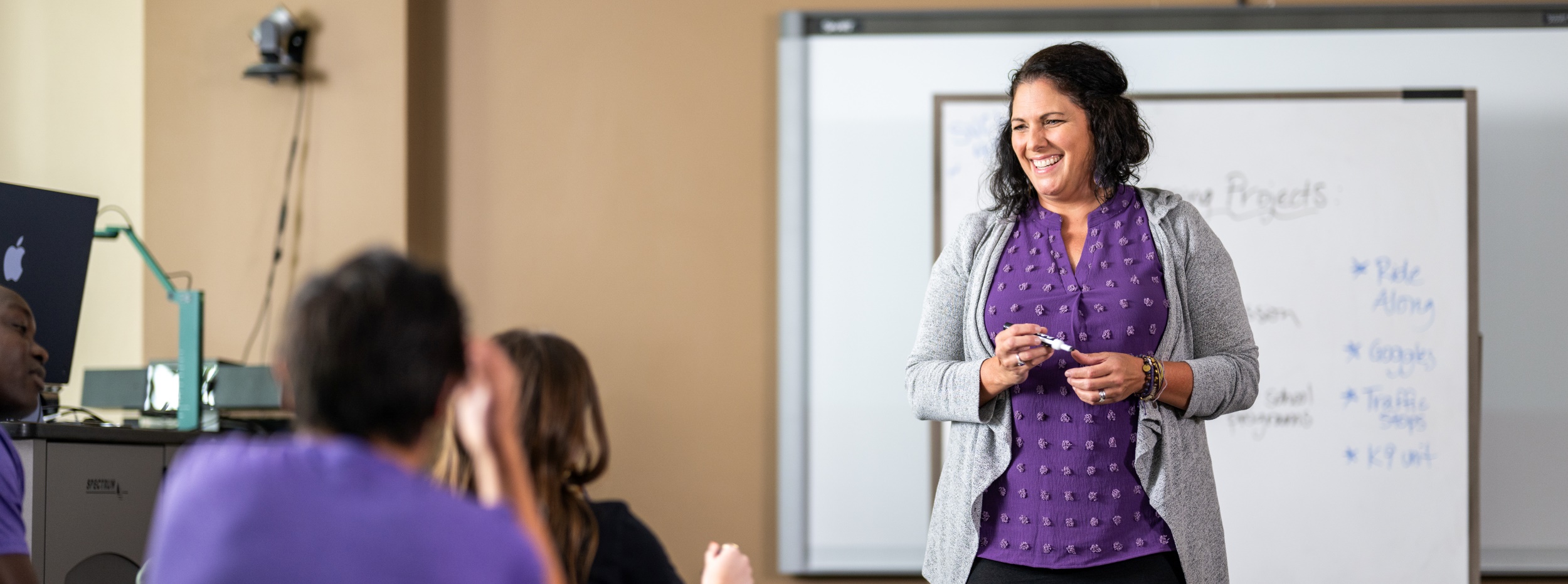 Teacher talking to students