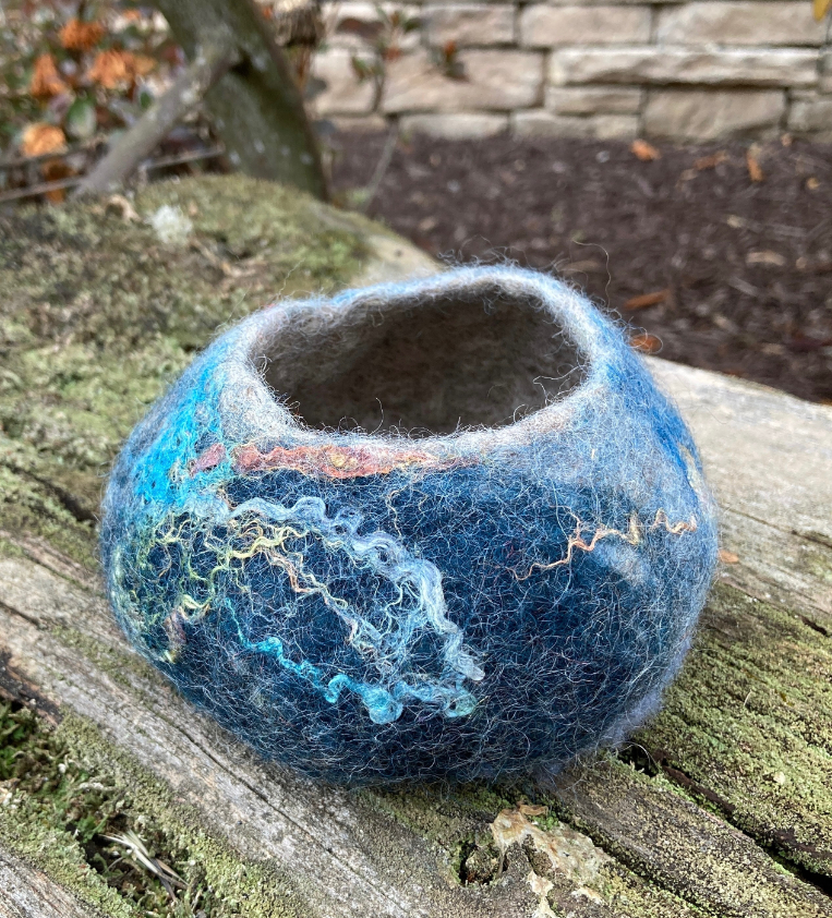 A blue felted bowl