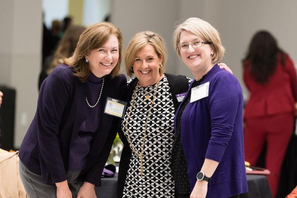 2019 women's conference, group of attendees smiling