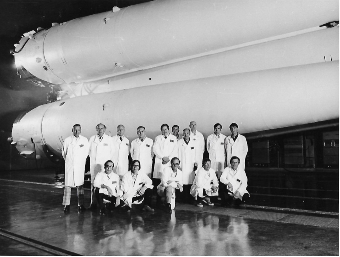 Russian Flight Soyuz NASA Test Team. That is the flight 1st stage booster in the background. We were the first Americans to visit the Soviet launch site. I’m standing in the back right.