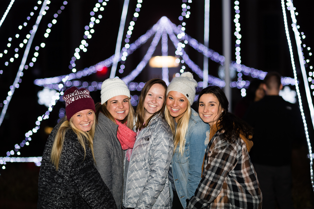More than a thousand students drank hot chocolate, sang Christmas carols and got a free T-shirt to celebrate the third annual "Lighting the Quad" event on Tuesday night.