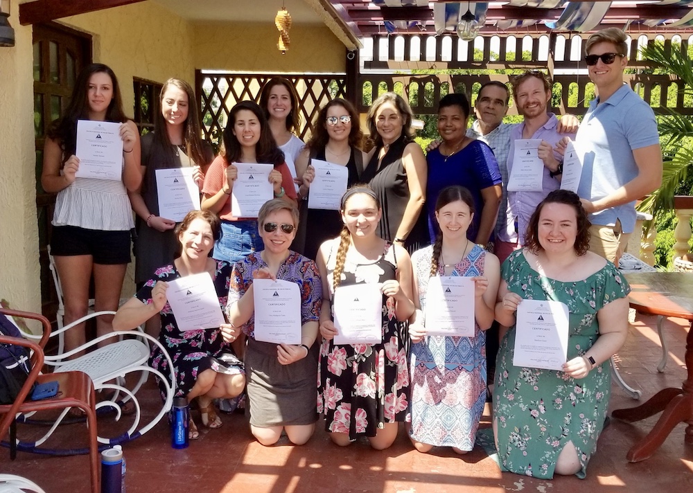 Pictured with the certificates of completion from Cuba’s National School of Public Health, kneeling, from left, are nursing professor Melissa Geist, and students Cary Cass, Chelsea Pickett and Madison Dunn; and in the back, Natalie Stewart, Nicole Kirby, Hannah Loewenberg, Jordan Fitzgerald, ENSAP faculty members, Anthony Geist and Tanner Dunn.