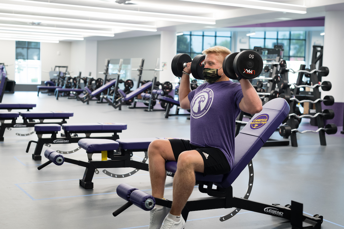 Tennessee Tech student Gannon Terry lifts weights in the new Marc L. Burnett Fitness and Recreation Center. The new weight room has more than 13,000 square feet of space.