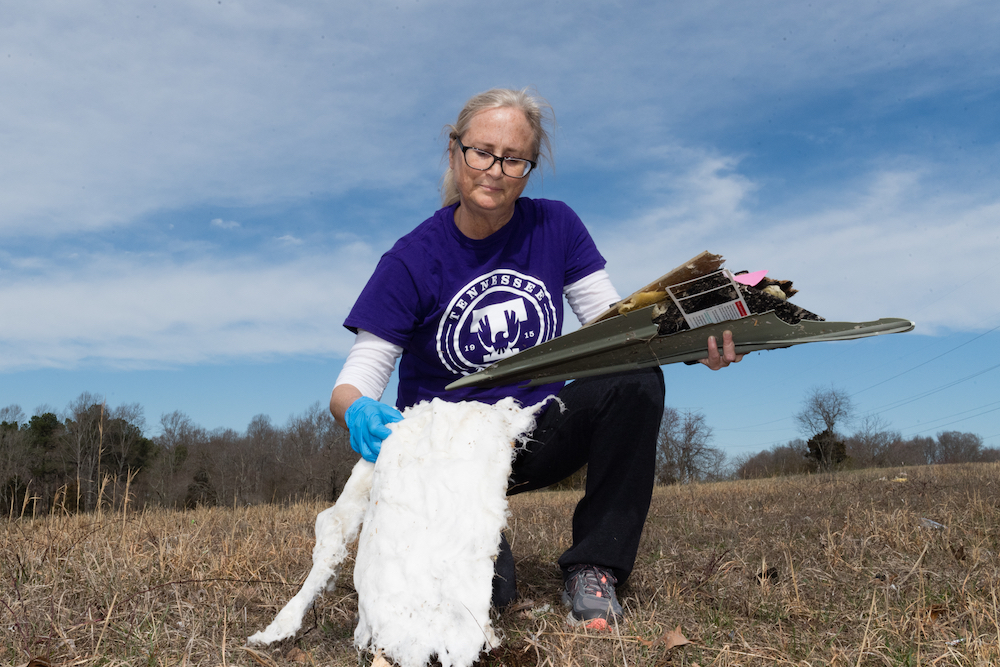 Jeannie Mills Smith, Tennessee Tech’s director of student success center in interdisciplinary studies, helps with clean-up efforts after a tornado ripped through Putnam County on Tuesday.