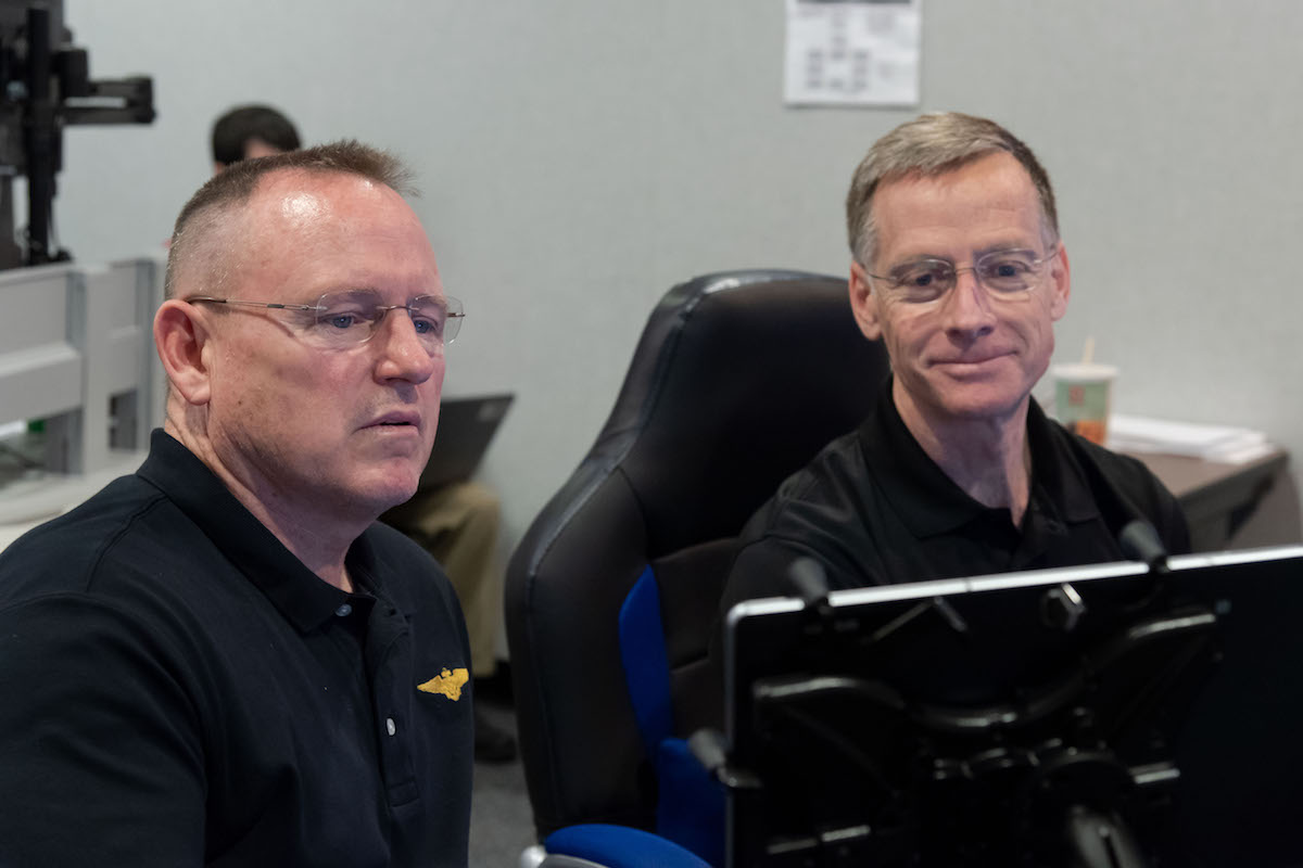 NASA astronaut Barry “Butch” Wilmore, left, and Chris Ferguson, director of Mission Integration and Operations at Boeing, train for the first flight of Boeing’s CST-100 Starliner spacecraft, which will carry astronauts to the International Space Station as part of NASA’s Commercial Crew Program. Credits: NASA