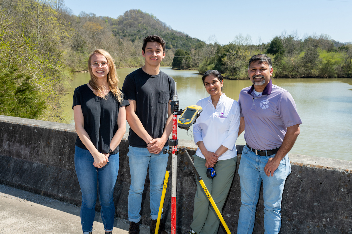 Tennessee Tech students Maci Arms and Thomas Harris along with Tania Datta and Alfred Kalyanapu, associate professors in civil and environmental engineering, are conducting research in Gainesboro to help with recent flooding problems.