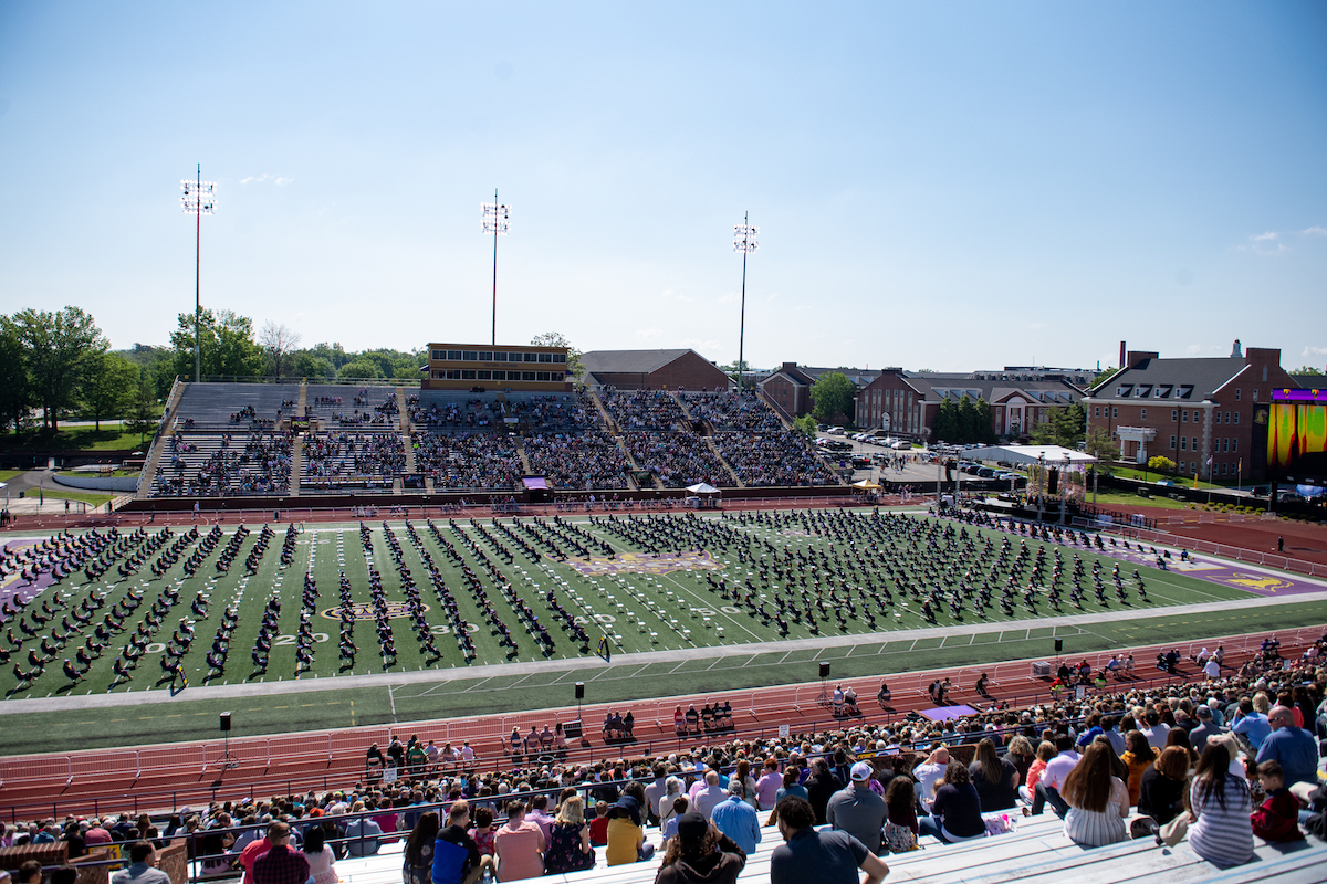 ) Friday was the first time commencement ceremonies had been held outdoors.
