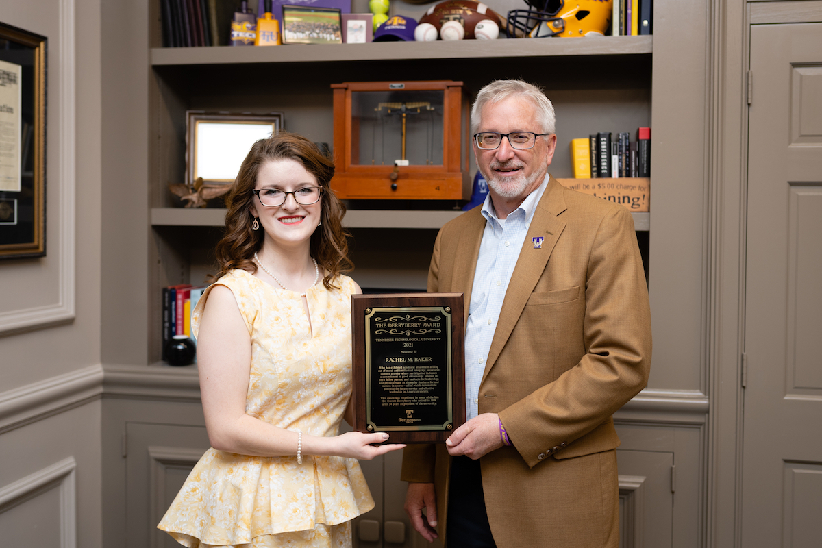 Rachel Baker is presented the Derryberry Award by Tennessee Tech president Phil Oldham.
