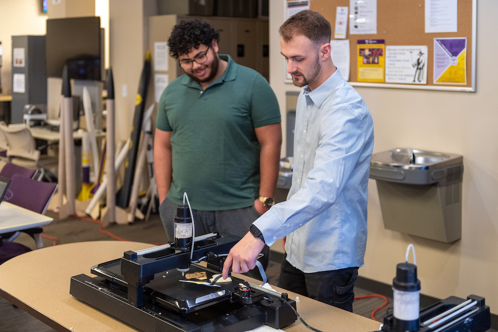 Students use a 3-D printer to make pancakes at a recent event in Tennessee Tech's iMaker Space.