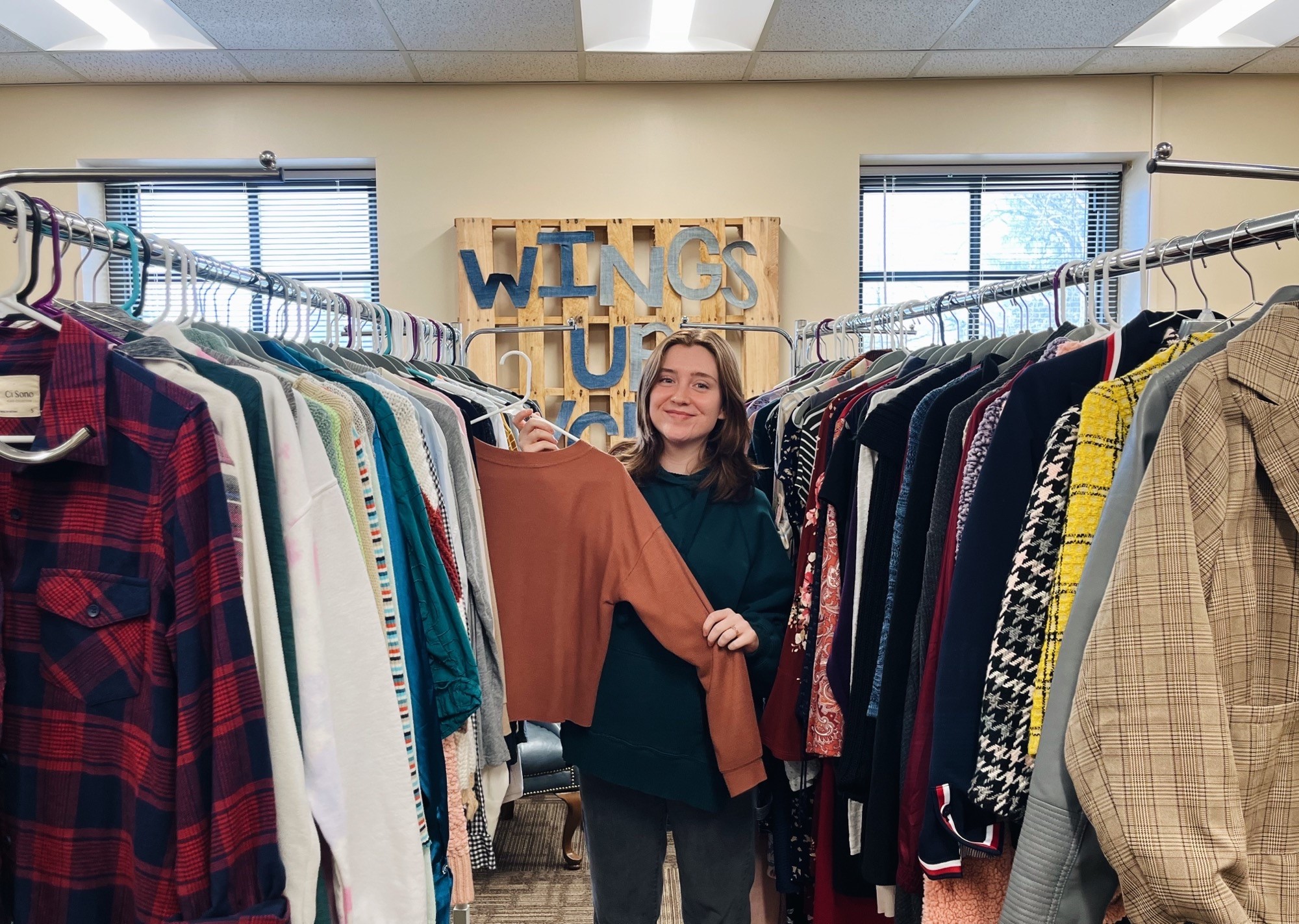 Erika Phillips, a senior design students major at Tech, is pictured at the Wings Up-Cycled store.
