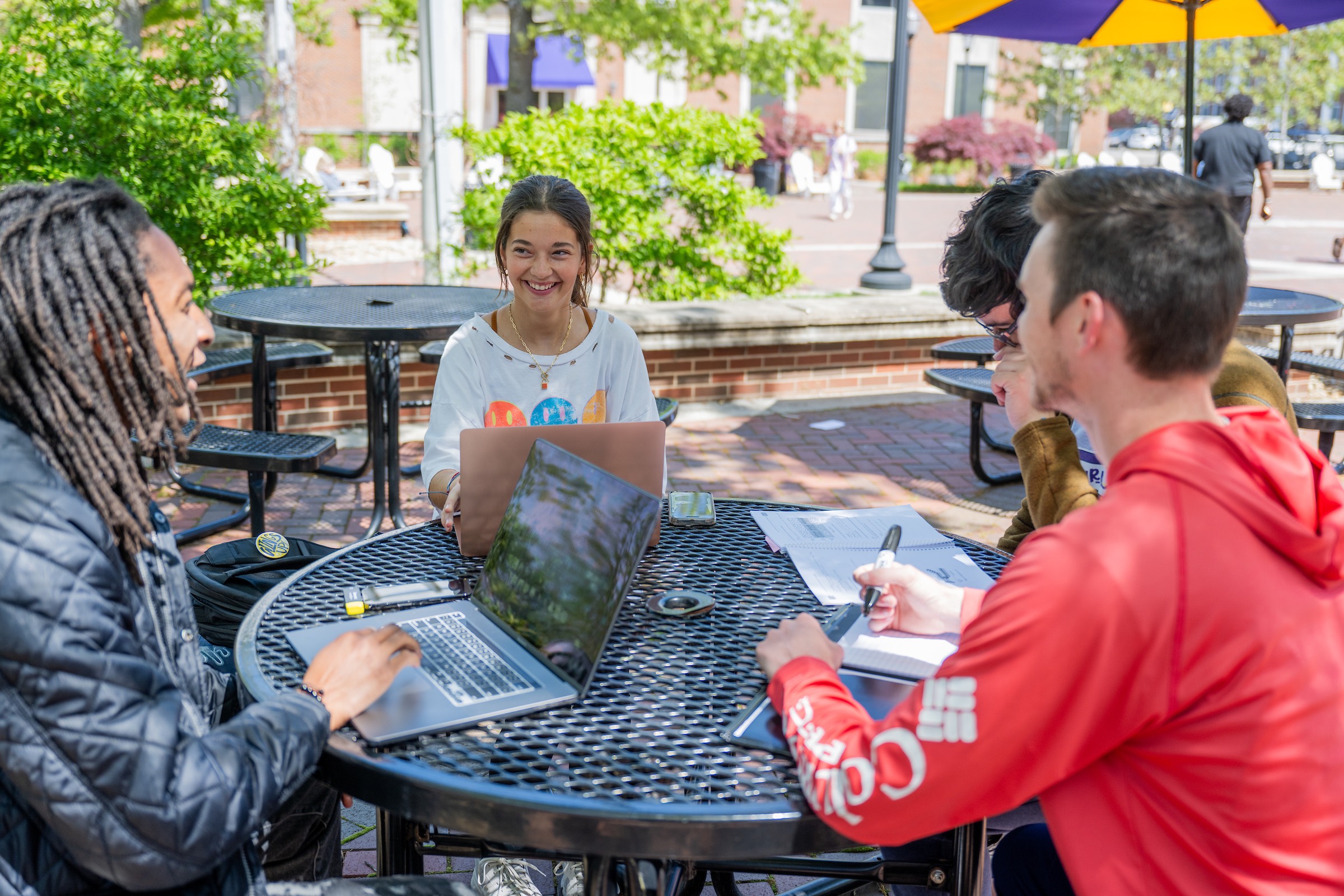 Students study on Tech's Centennial Plaza.