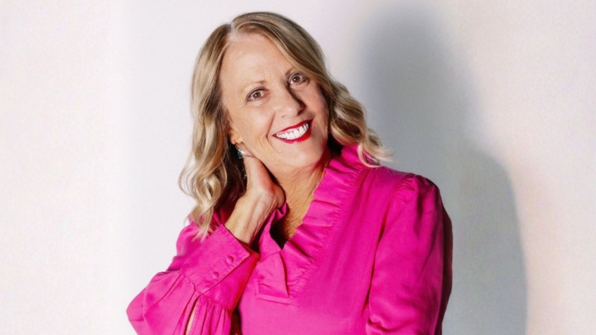 Headshot of Joy McCaleb Poteet smiling 