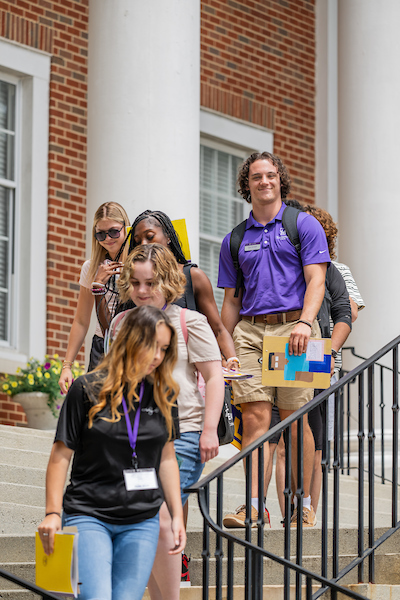 A SOA leading students to an activity.