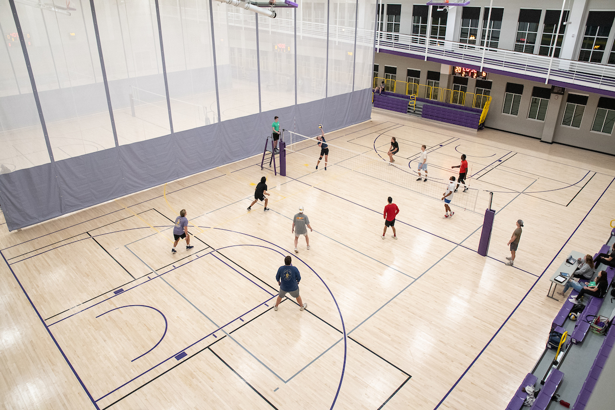 people playing indoor volleyball