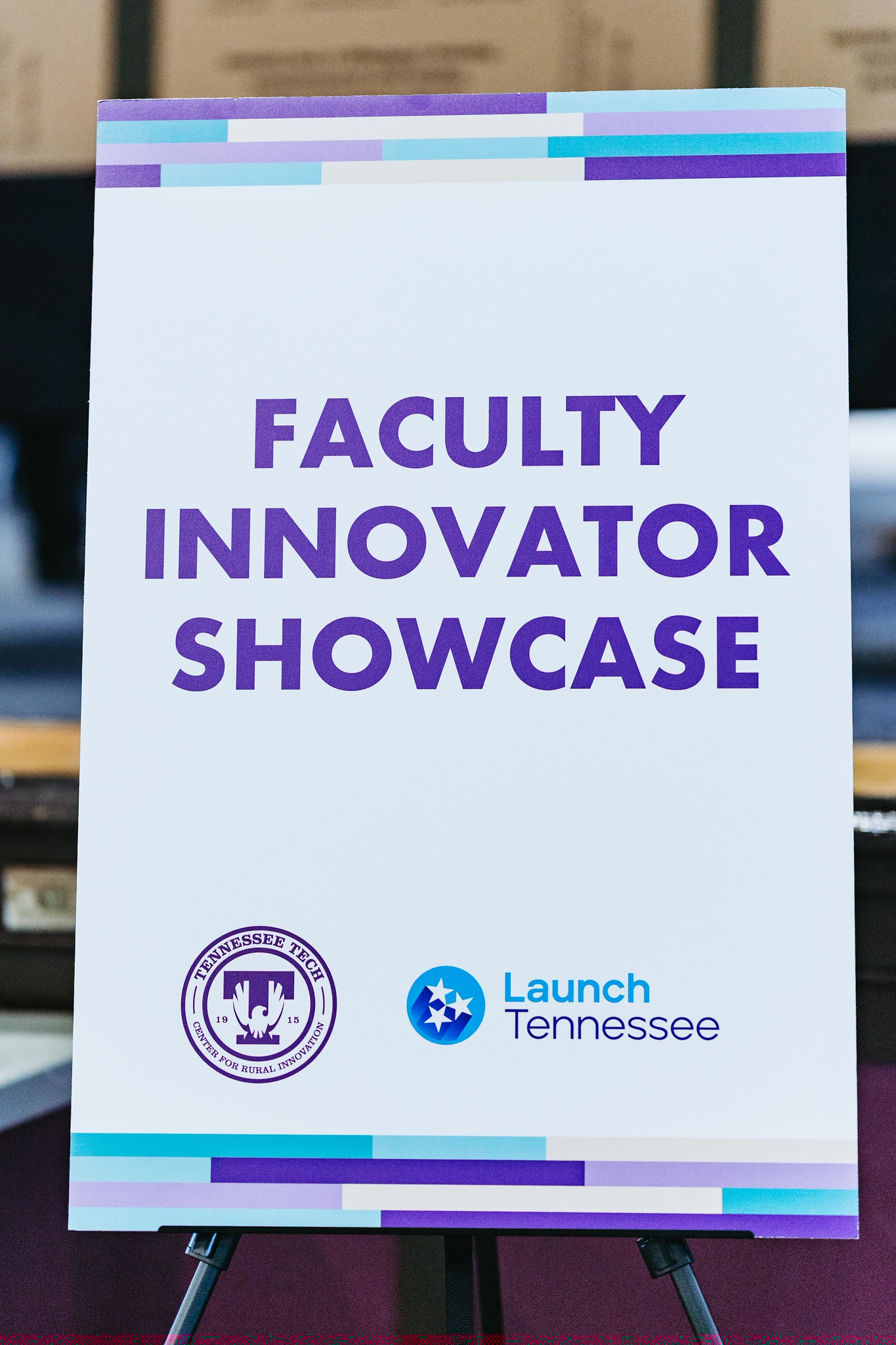 Showcase sign displayng Faculty Innvoator Showcase title and the TN Tech and LaunchTNlogos