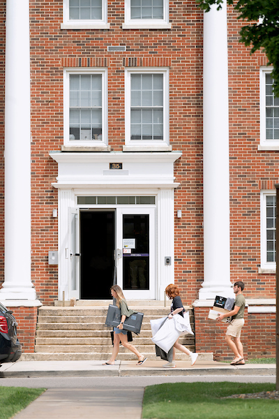 Students moving into a residential hall.