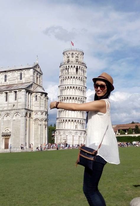 Girl with leaning tower.