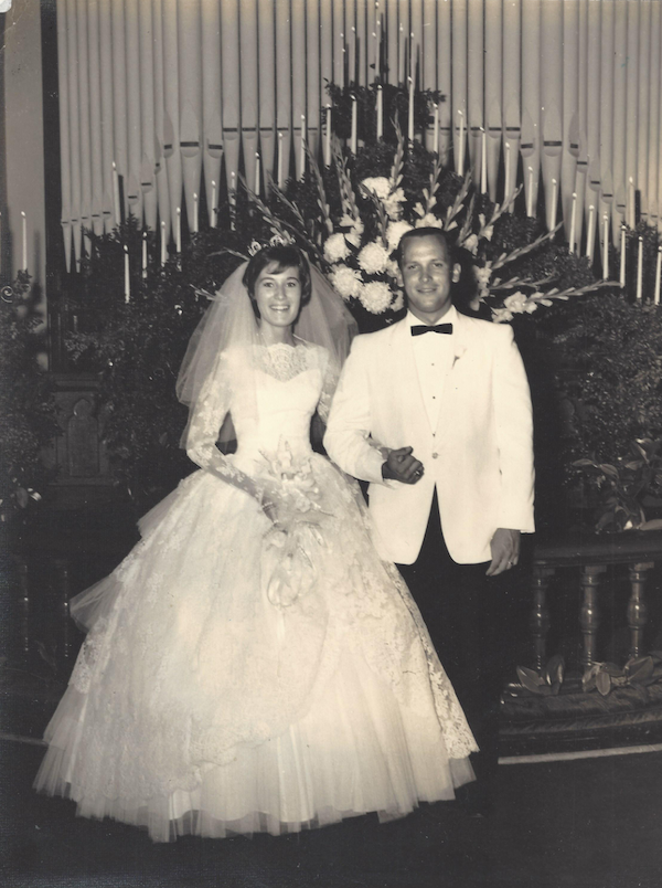 A black and white photo of Larry and Emma Ferguson at their wedding.