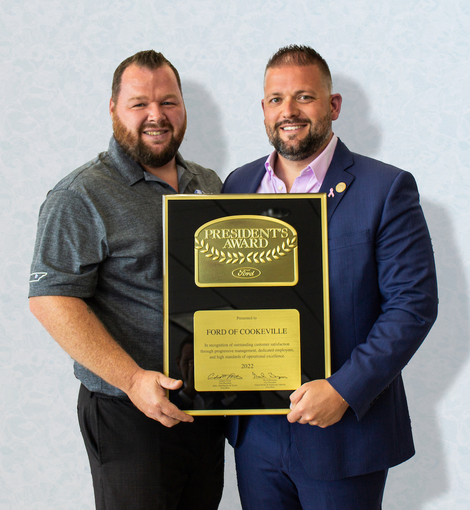 Ford Lincoln of Cookeville Service Director Ryan Mollinet (left) and General Manager Geoff Root (right) holding Ford of Cookeville's seventh consecutive Ford President's Award.