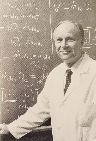 Dr. Purdy at a chalkboard