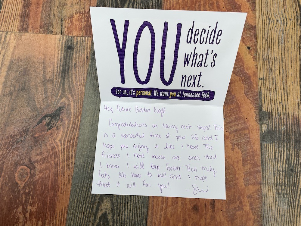 A photo of a notecard encouraging a potential student to come to Tennessee Tech.
