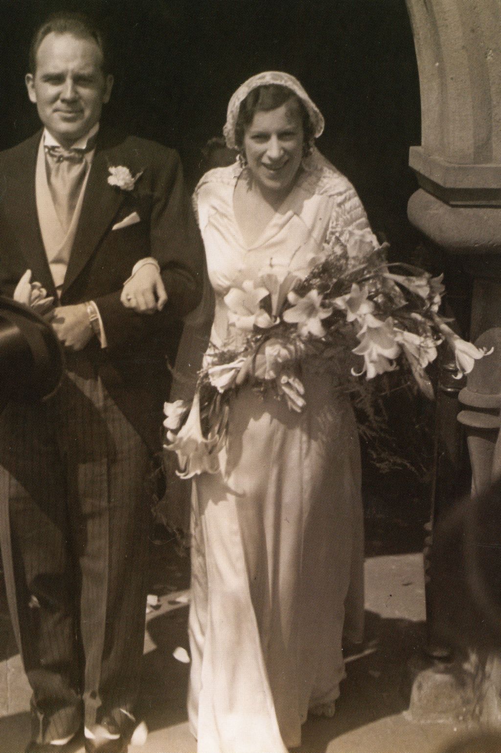 A black and white wedding photo of Dr. Everett Deryberry and Joan Pitt Rew Derryberry