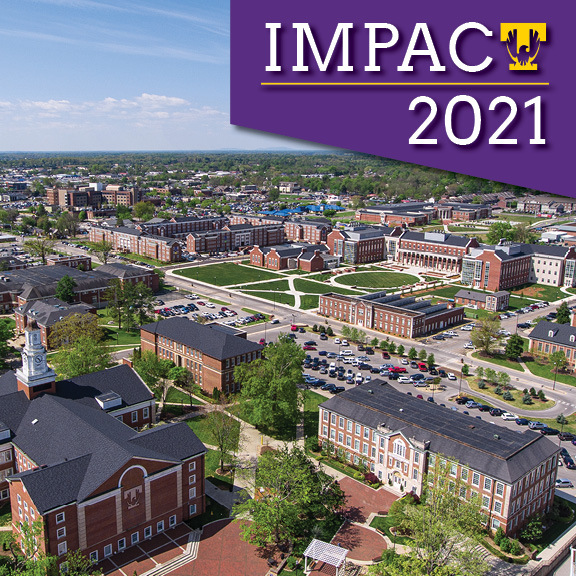 A drone view of campus with the title "Impact 2021" in a purple field in the upper right corner of the image.