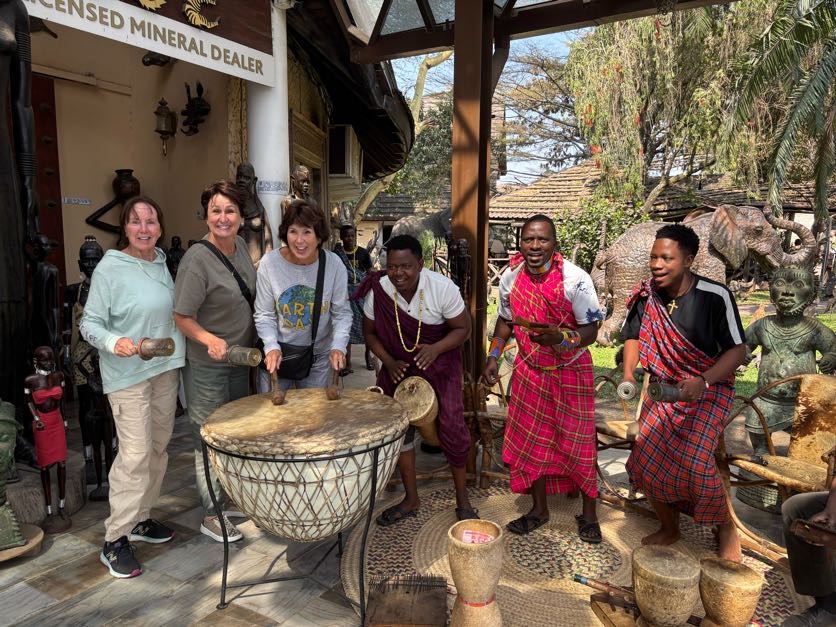 people playing traditional African drum